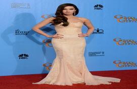 La siempre atractiva Megan Fox se encargó de mostrar su perfecta figura en un vestido ceñido. No parece que hubiera estado embarazada. (AP)
