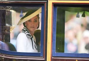 Britain's Kate, Princess of Wales travels along The Mall to the Trooping the Color ceremony at Horse Guards Parade, London, Saturday, June 15, 2024. Britain is putting on a display of birthday pageantry for King Charles III, a military parade that is the Princess of Wales’ first public appearance since her cancer diagnosis early this year. (James Manning/PA via AP)