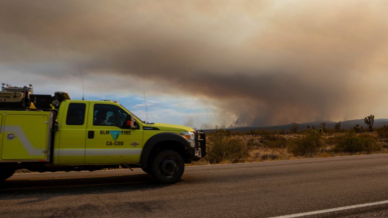 A fire truck heading towards the York Fire on Sunday, July 30, 2023, in the Mojave National Preserve, Calif. Crews battled “fire whirls” in California’s Mojave National Preserve this weekend as a massive wildfire crossed into Nevada amid dangerously high temperatures and raging winds. (AP Photo/Ty O'Neil)