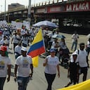 Cali: Marcha del día del trabajo. Centenares de trabajadores se movilizaron por la autopista sur oriental de la ciudad en conmemoración del día del trabajo 1 de mayo. Foto José L Guzmán. EL País,