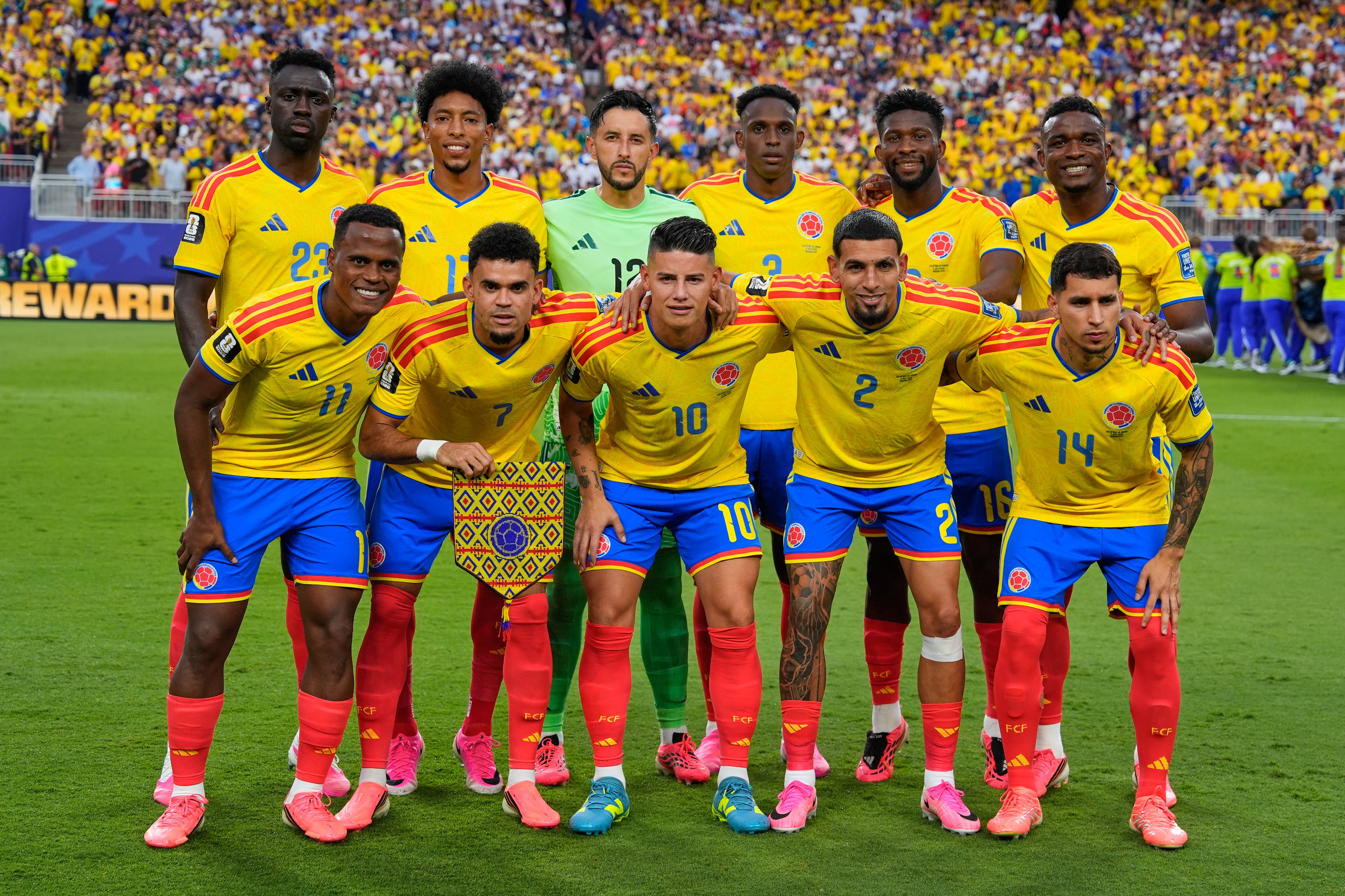 Colombia pose for a team photo ahead of the World Cup round of 32 soccer match between Colombia and Ghana in Kansas City, Mo., Thursday, July 3, 2026. (AP Photo/Charlie Riedel)