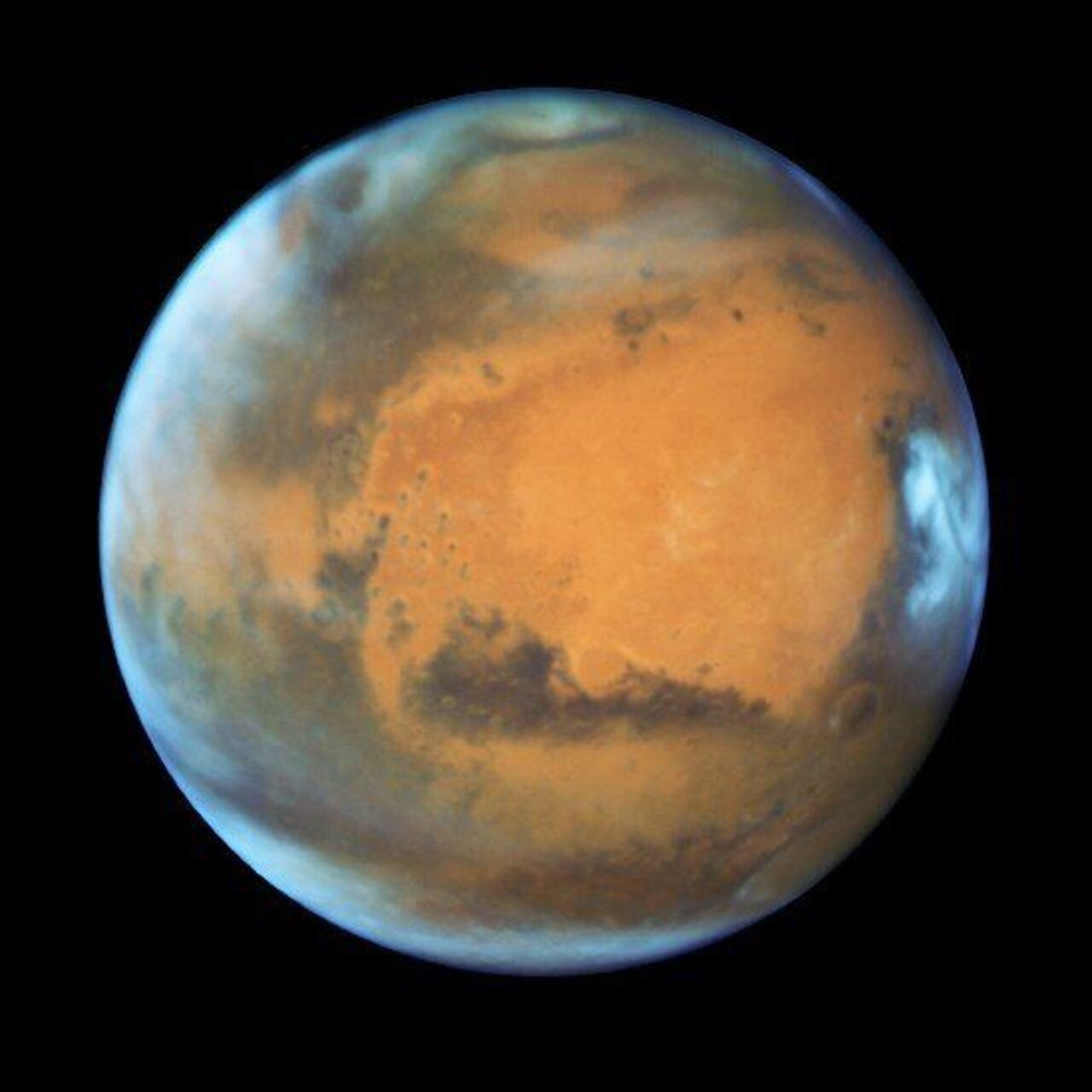 La temperatura en los polos de Marte llega a 150 grados bajos cero. Esta imagen de Marte fue captada por el telescopio espacial Hubble en 2016. BBC - NASA STSCI