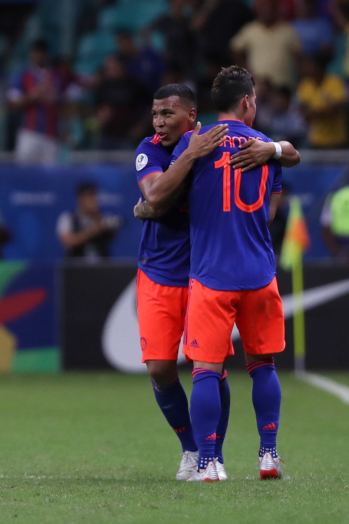 SALVADOR, BRAZIL - JUNE 15: Roger Martínez of Colombia celebrates with teammate James Rodriguez after scoring the first goal of his team during the Copa America Brazil 2019 group B match between Argentina and Colombia at Arena Fonte Nova on June 15, 2019 in Salvador, Brazil. (Photo by Bruna Prado/Getty Images)