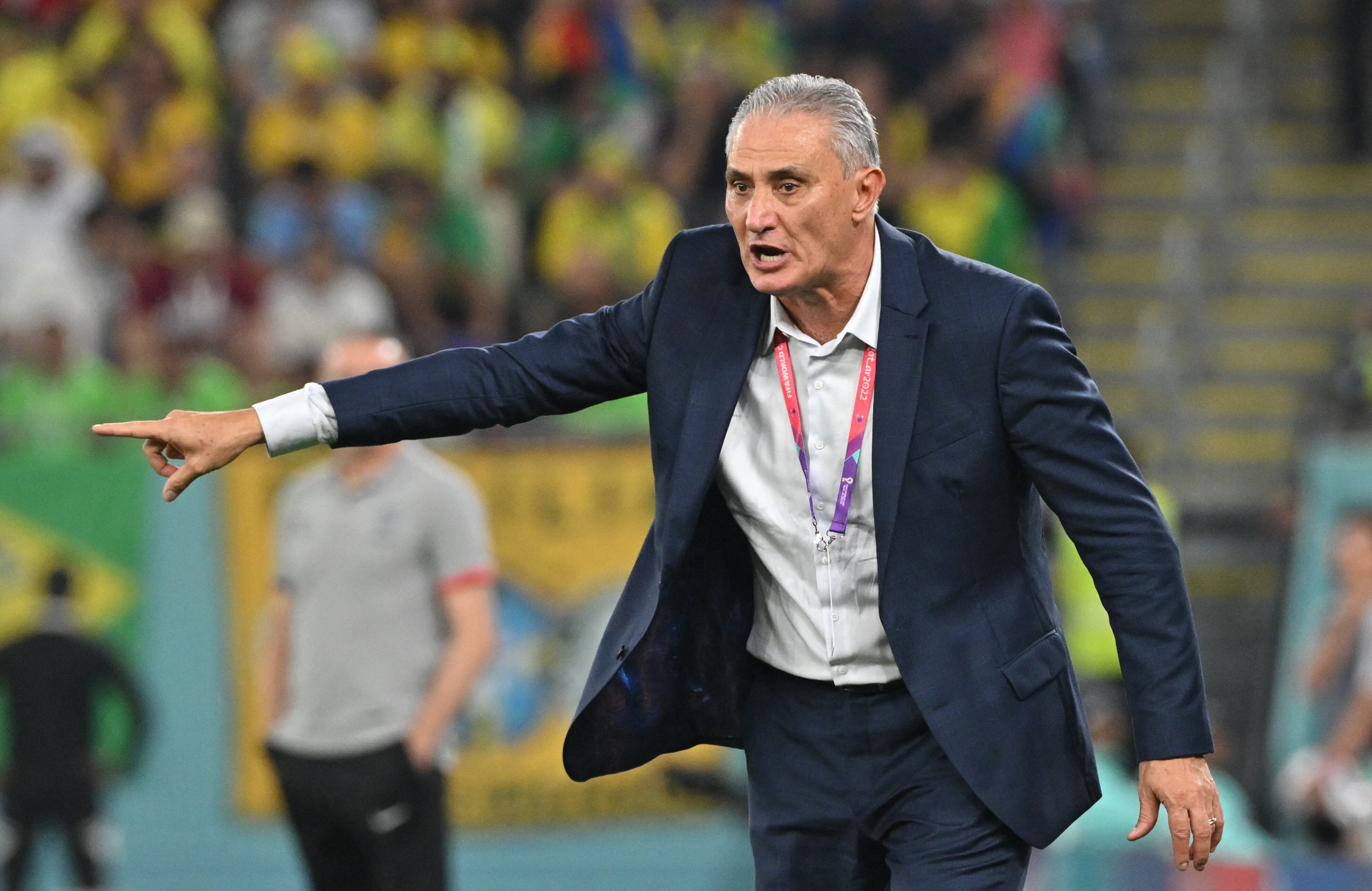 (FILES) Brazil's coach Tite gives instructions to his players from the touchline during the Qatar 2022 World Cup round of 16 football match between Brazil and South Korea at Stadium 974 in Doha on December 5, 2022. Former Brazil national team coach Tite is the new coach of Flamengo to replace Argentine Jorge Sampaoli, who left almost two weeks ago after losing the Brazilian Cup, a top executive of the popular Rio de Janeiro club and protagonist of a disappointing season, announced on October 9, 2023. (Photo by NELSON ALMEIDA / AFP)