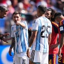 Argentina's Lionel Messi (10) and Facundo Medina (25) talk to referee Slavko Vincic, of Slovenia, after Spain's Pau Cubarsi was fouled during the World Cup final soccer match between Spain and Argentina in East Rutherford, N.J., near New York, Sunday, July 19, 2026. (AP Photo/Abbie Parr)