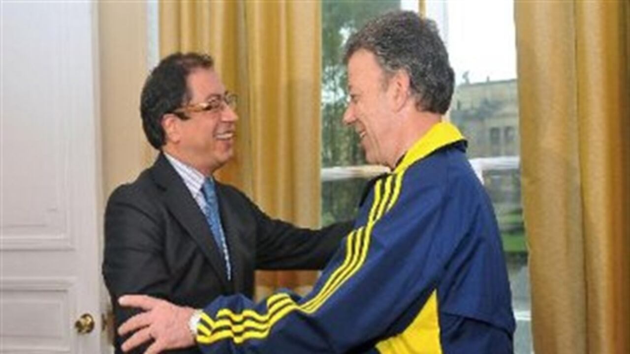 Gustavo Petro y Juan Manuel Santos