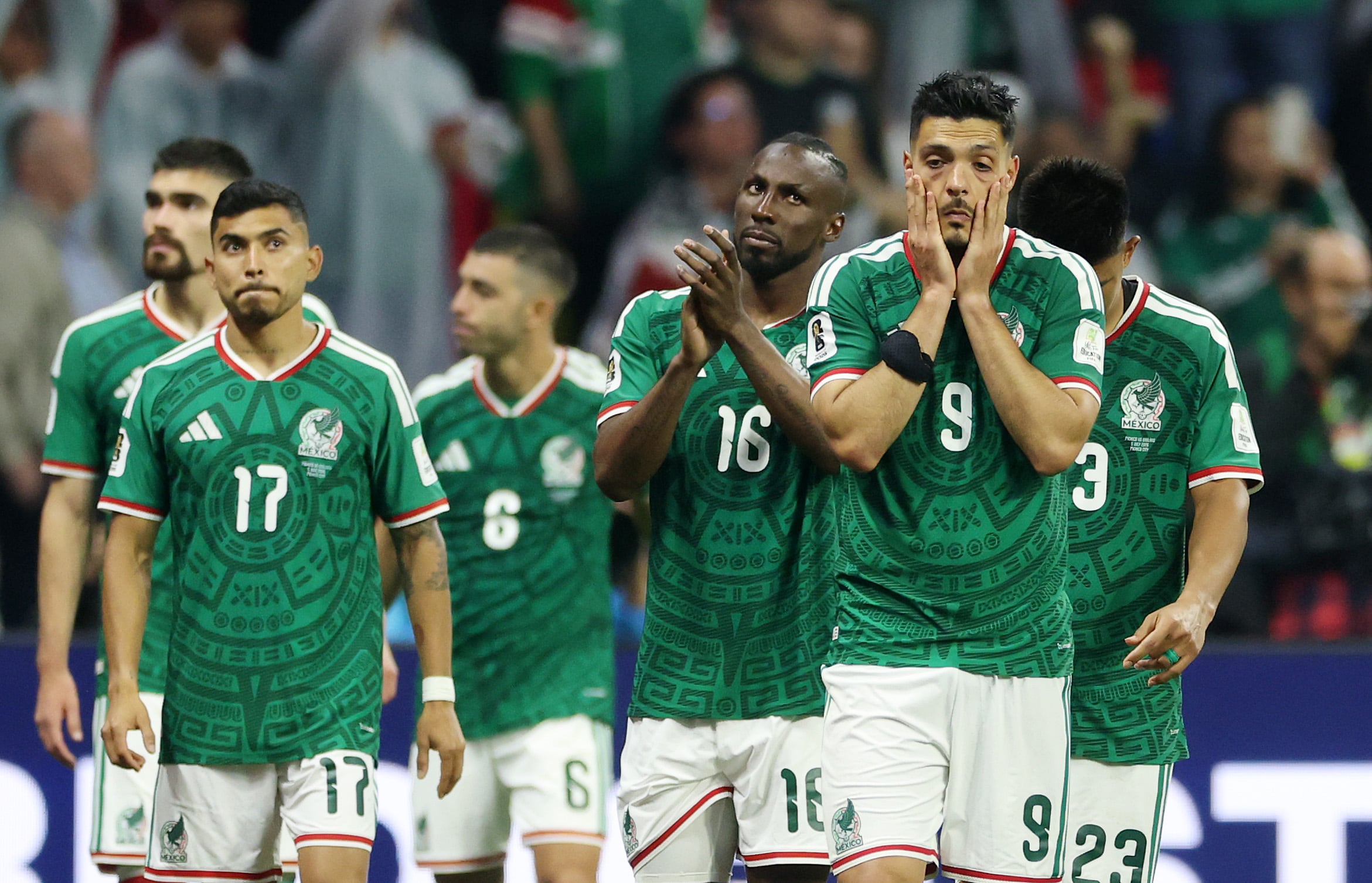 MEXICO CITY, MEXICO - JULY 05: Orbelin Pineda #17, Julian Quinones #16 and Raul Jimenez #9 of Mexico react after the 2-3 loss during the FIFA World Cup 2026 Round of 16 match between Mexico and England at Mexico City Stadium on July 05, 2026 in Mexico City, Mexico. (Photo by Richard Pelham/Getty Images)