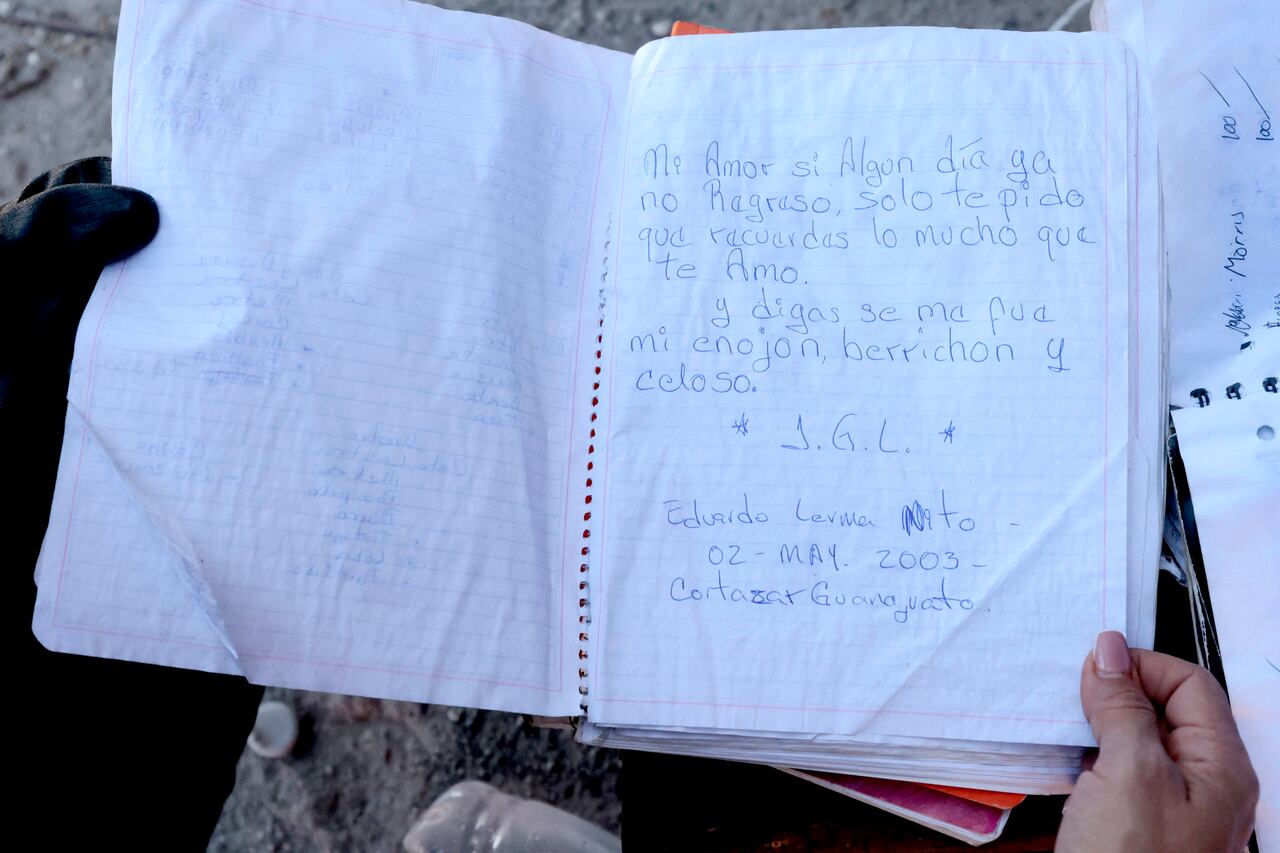 A notebook that reads in spanish 'My love, if one day I don't come back, I only ask you to remember how much I love you' is seen at the Izaguirre Ranch in the community of La Estanzuela, where the collective 'Guerreros Buscadores' located three human crematoriums while searching for their relatives in Teuchitlan, Jalisco state, Mexico on March 5, 2025. Mexico's Attorney General's Office and the federal government will investigate alleged clandestine crematoriums located in a rural area of the western Mexican state of Jalisco, local authorities said on March 12. (Photo by ULISES RUIZ / AFP)