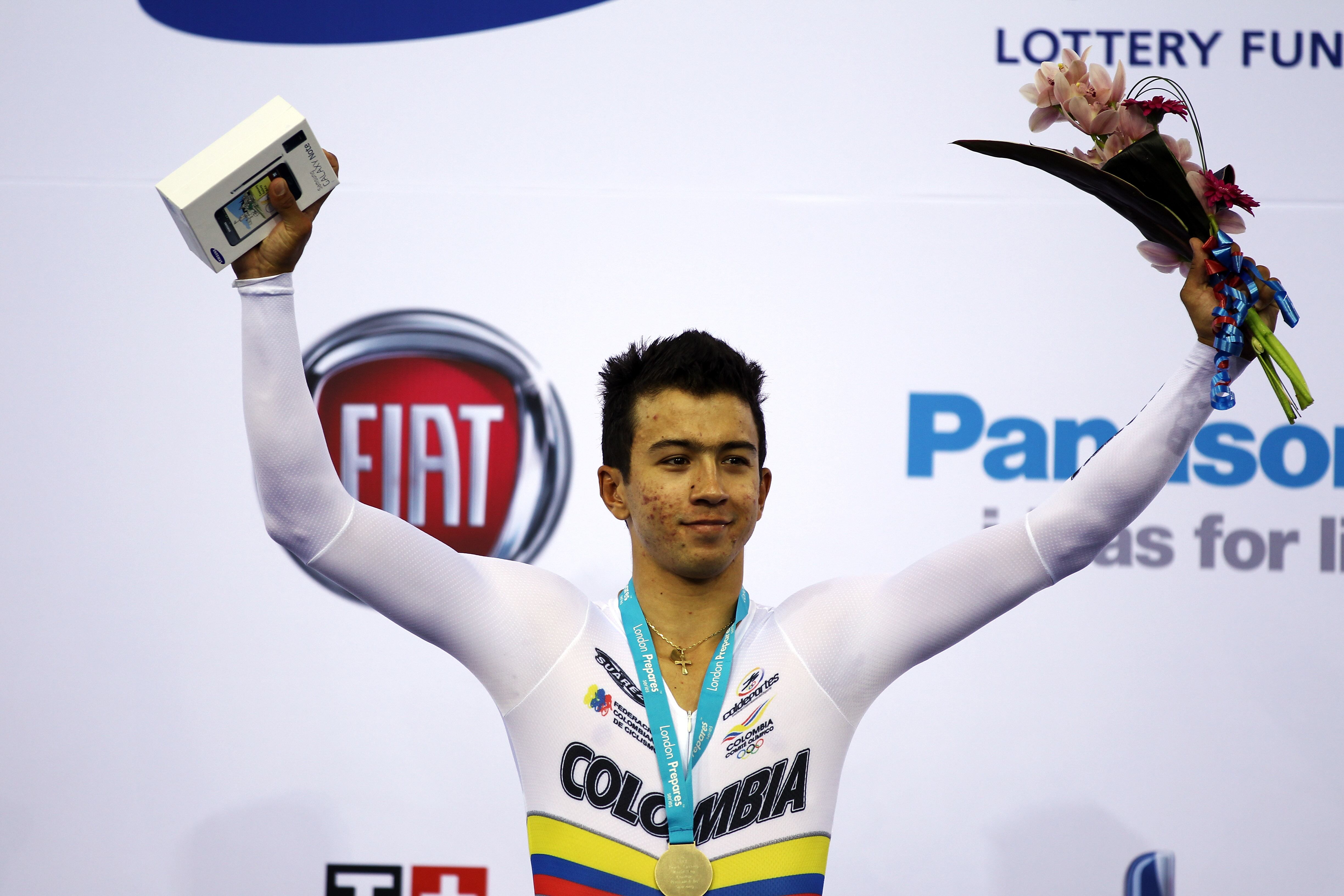 LONDON, ENGLAND - FEBRUARY 18:  Juan Esteban Arango of Colombia celebrates on the podium after winning Men's Omnium during the UCI Track Cycling World Cup - LOCOG Test Event for London 2012 at the Olympic Velodrome on February 18, 2012 in London, England.  (Photo by Bryn Lennon/Getty Images)