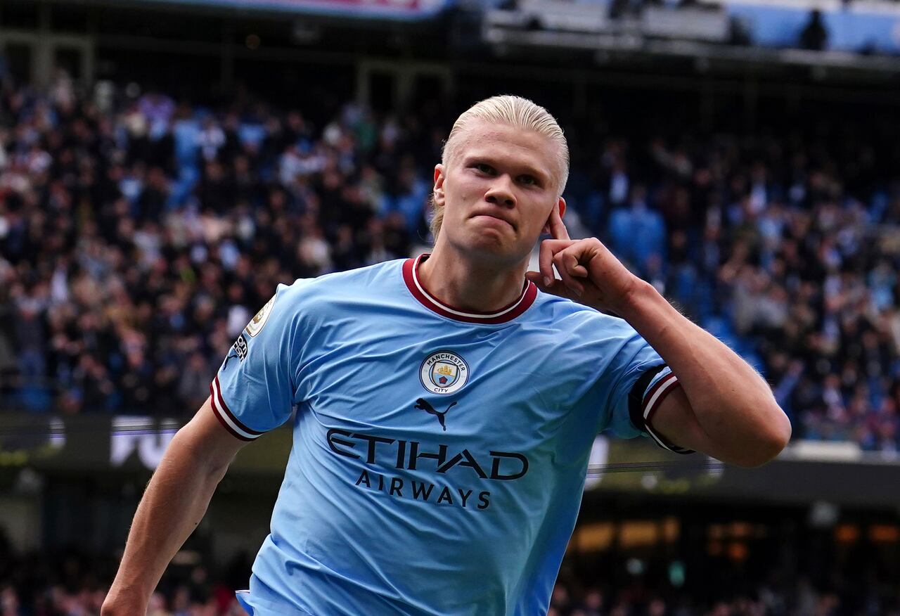 Manchester City's Erling Haaland celebrates after scoring his side's third goal during the English Premier League soccer match between Manchester City and Manchester United at Etihad stadium in Manchester, England, Sunday, Oct. 2, 2022. (Martin Rickett/PA via AP)