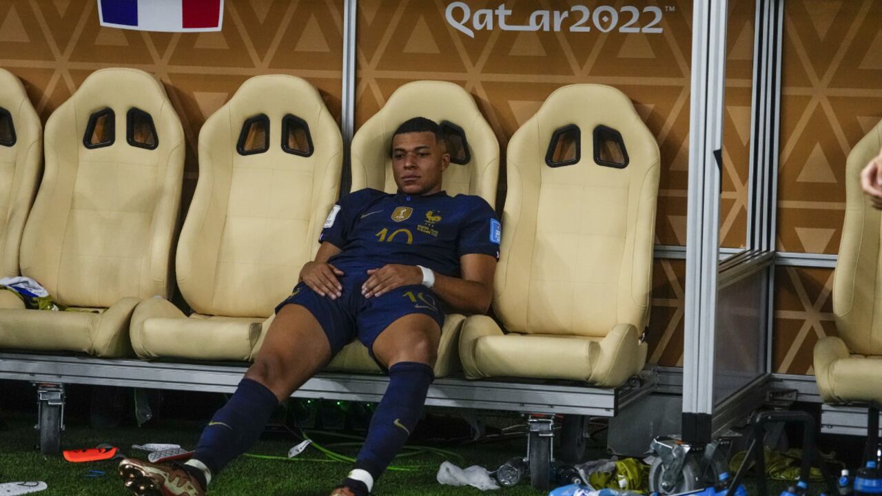 FILE - France's Kylian Mbappe sits on the bench at the end of the World Cup final soccer match between Argentina and France at the Lusail Stadium in Lusail, Qatar, Sunday, Dec.18, 2022. (AP/Manu Fernandez, File)