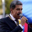 Venezuelan President Nicolas Maduro speaks to supporters on his inauguration day for a third term at Miraflores presidential palace in Caracas, Venezuela, Friday, Jan. 10, 2025. (AP Photo/Ariana Cubillos)
