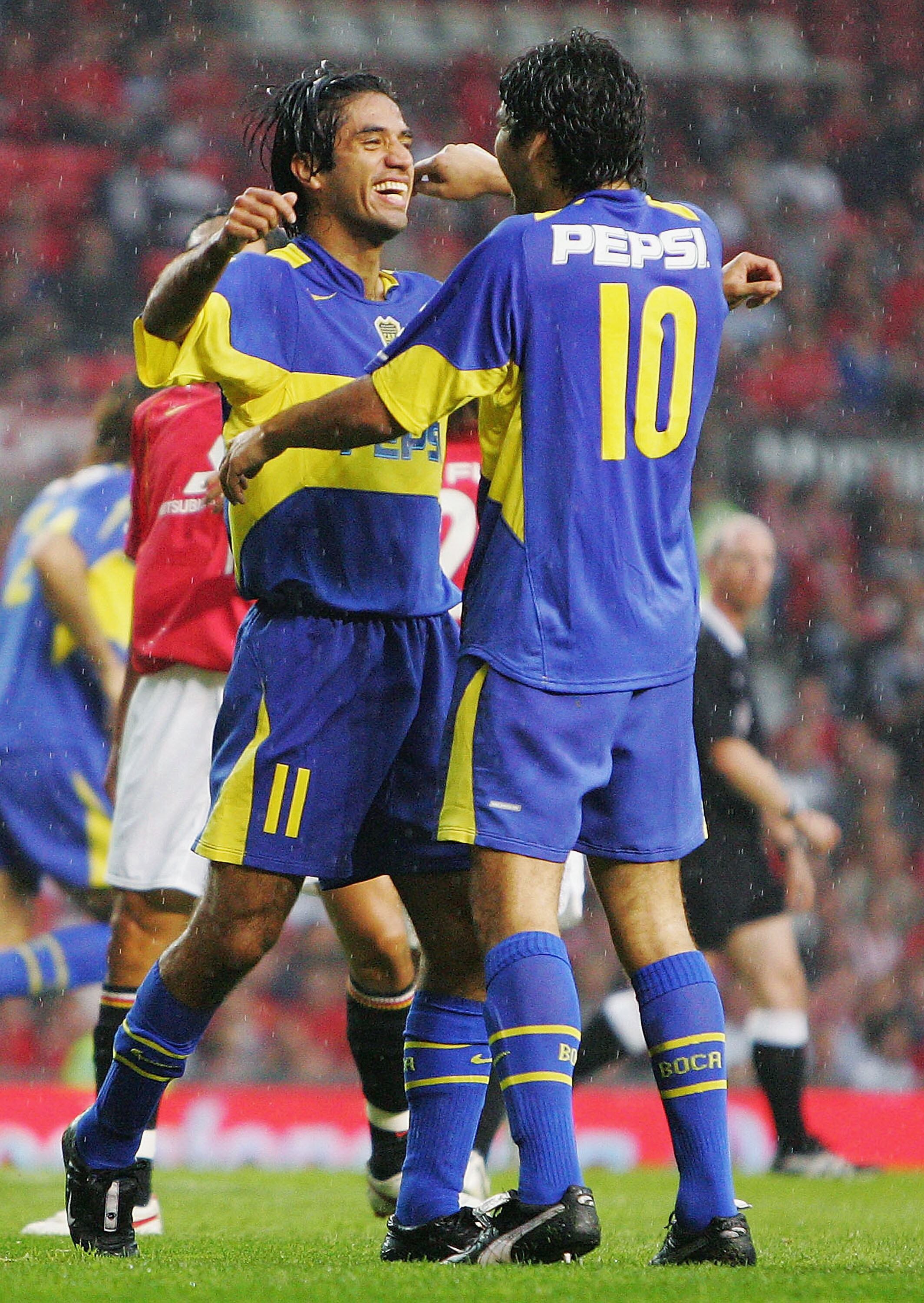 Fabián Vargas con Juan Román Riquelme en Boca.