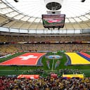 The flags of Switzerland, left, and Colombia, are displayed before their the World Cup round of 16 soccer match in Vancouver, British Columbia, Tuesday, July 7, 2026. (AP Photo/Gregory Bull)