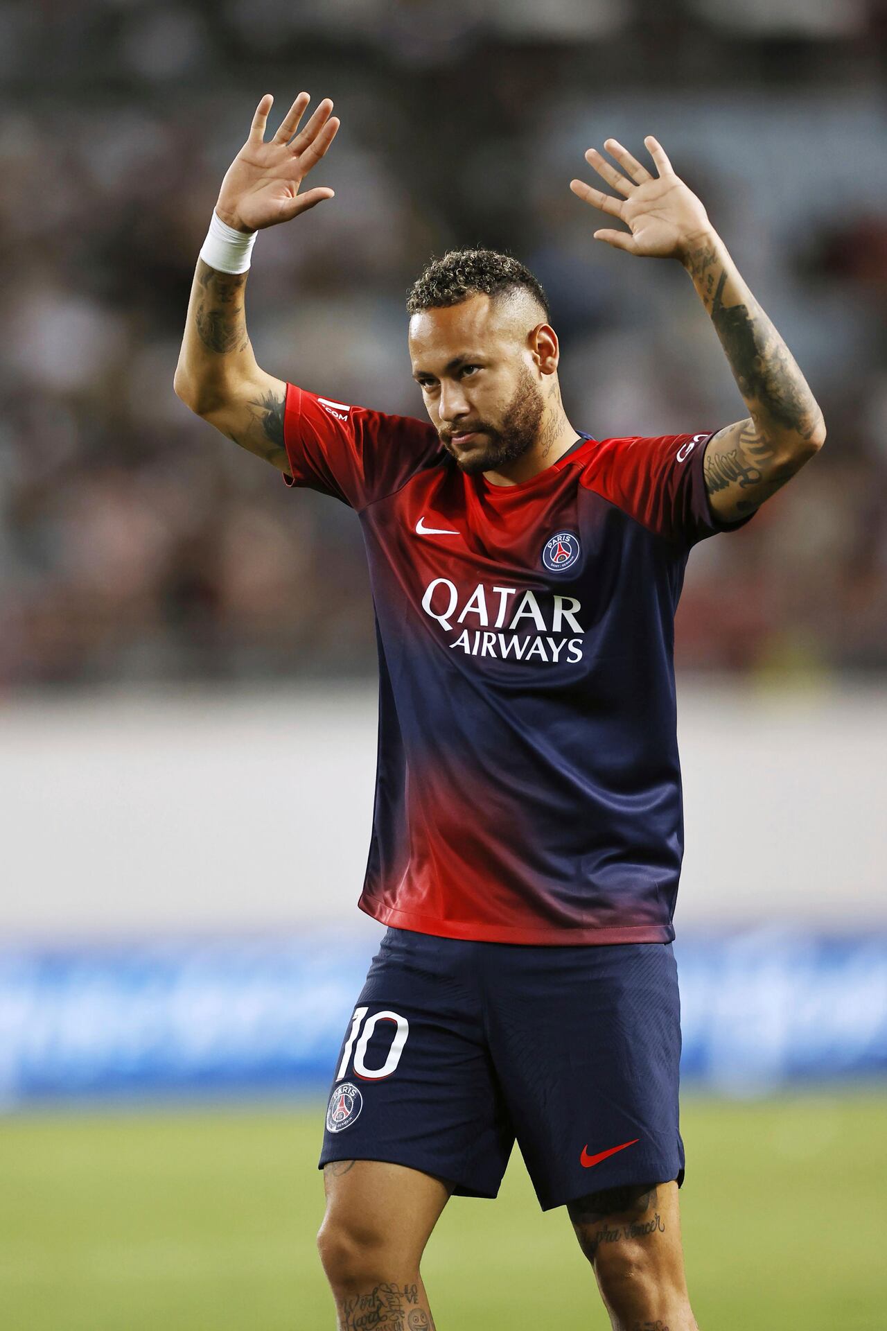 Paris Saint-Germain's Neymar acknowledges the supporters after a friendly soccer match against Al Nassr in Osaka, western Japan, Tuesday, July 25, 2023. (Kyodo News via AP)