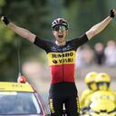 Belgium's Wout Van Aert celebrates as he crosses the finish line to win the eleventh stage of the Tour de France cycling race over 198.9 kilometers (123.6 miles) with start in Sorgues and finish in Malaucene, France, Wednesday, July 7, 2021. (AP Photo/Christophe Ena)