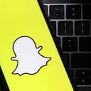 SAN ANSELMO, CALIFORNIA - FEBRUARY 03: In this photo illustration, the Snapchat logo is displayed on a cell phone screen on February 03, 2022 in San Anselmo, California. Shares of Snapchat surged in after hours trading after the company reported a better-than-expected fourth quarter earnings. (Photo illustration by Justin Sullivan/Getty Images)