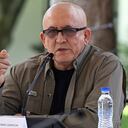 The first commander of the Colombian National Liberation Army (ELN), Antonio Garcia, speaks to the press during the document signing ceremony with the Colombian Government after announcing new peace talks, in Caracas, on October 4, 2022. - Colombia's government and a delegation from the National Liberation Army (ELN) leftist guerrillas announced on Tuesday they would next month restart peace talks suspended since 2019. ELN commander Antonio Garcia read out a statement in Caracas stating that the two parties would re-establish "the dialogue process after the first week of November 2022" with Venezuela, Cuba and Norway acting as guarantors for the talks. (Photo by Yuri CORTEZ / AFP)