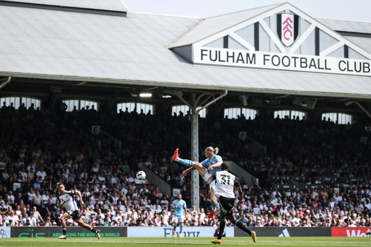 Manchester City's Norwegian striker #09 Erling Haaland attempts to control the ball during the English Premier League football match between Fulham and Manchester City at Craven Cottage in London on May 11, 2024. (Photo by Adrian DENNIS / AFP) / RESTRICTED TO EDITORIAL USE. No use with unauthorized audio, video, data, fixture lists, club/league logos or 'live' services. Online in-match use limited to 120 images. An additional 40 images may be used in extra time. No video emulation. Social media in-match use limited to 120 images. An additional 40 images may be used in extra time. No use in betting publications, games or single club/league/player publications. /