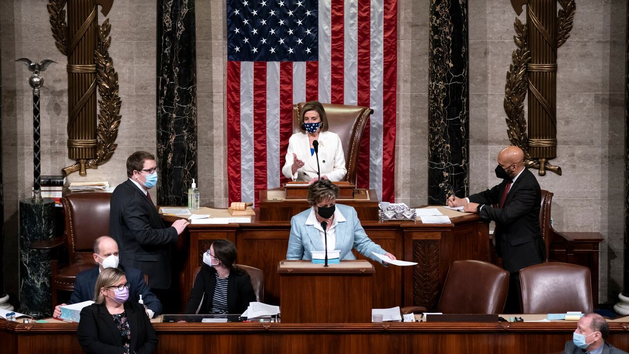 Speaker of the House Nancy Pelosi, D-Calif., leads the vote to approve a landmark $1.9 trillion COVID-19 relief bill, at the Capitol in Washington, Wednesday, March 10, 2021. (AP Photo/J. Scott Applewhite)