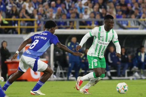 Marino Hinestroza of Atletico Nacional and Dewar Victoria of Millonarios F.C. fight for the ball during the match between Millonarios F.C. and Atletico Nacional on Matchday 13 of the BetPlay DIMAYOR I 2025 League, played at the Nemesio Camacho El Campin Stadium in Bogota, Colombia. (Photo by Daniel Garzon Herazo/NurPhoto via Getty Images)