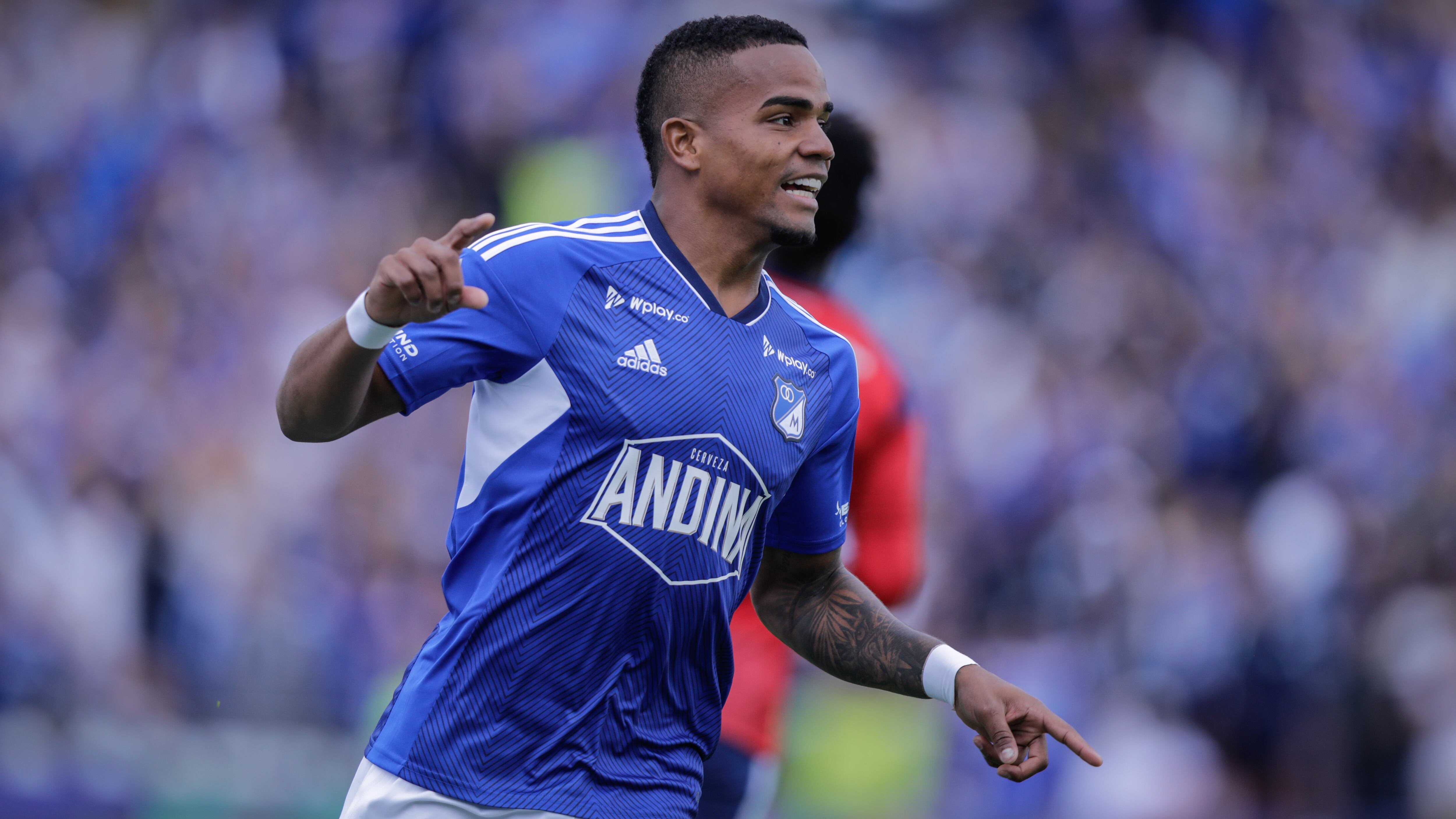 BOGOTA, COLOMBIA - JANUARY 21: Edgar Guerra of Millonarios celebrates after scoring the first goal during the Liga BetPlay 1st round match between Millonarios and Independiente Medellin at Estadio El Campin on January 21, 2024 in Bogota, Colombia. (Photo by Andres Rot/Getty Images)