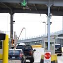 FILE - Motorists pay toll at Gateway International Bridge, March 6, 2023, in Brownsville, Texas, to cross into Matamoros, Mexico. Texas and federal health officials are warning U.S. residents to cancel planned surgeries in Matamoros after five people from Texas who got procedures there came back and developed suspected cases of fungal meningitis. One of them died, officials said Tuesday, May 16. (Miguel Roberts/The Brownsville Herald via AP, File)