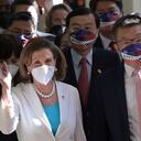 Visiting US House Speaker Nancy Pelosi (C) waves to journalists during her arrival at the Parliament in Taipei on August 3, 2022. (Photo by Sam Yeh / AFP)