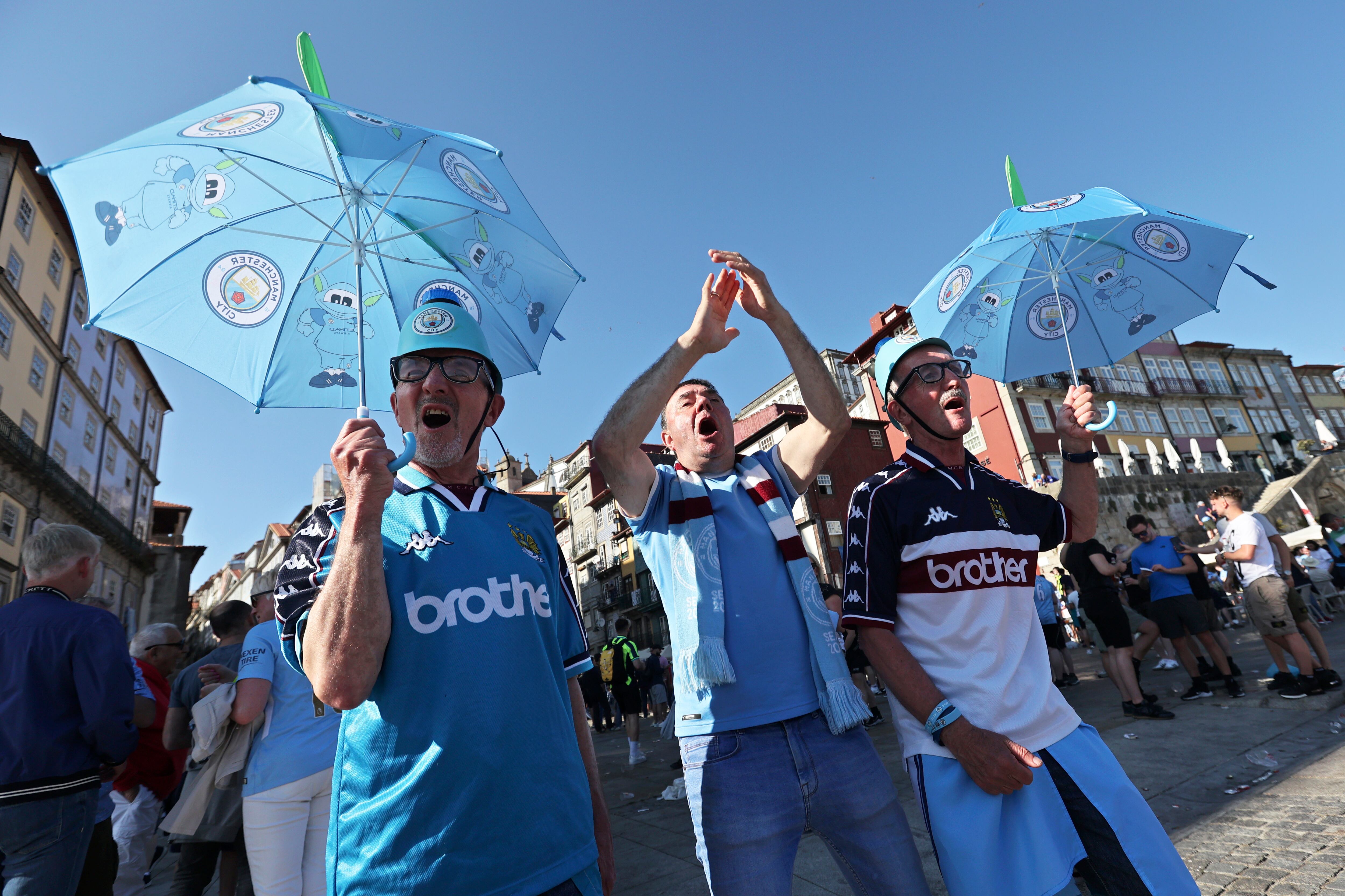 Manchester City supporters chant by the Douro river bank in Porto. (AP Photo/Luis Vieira)