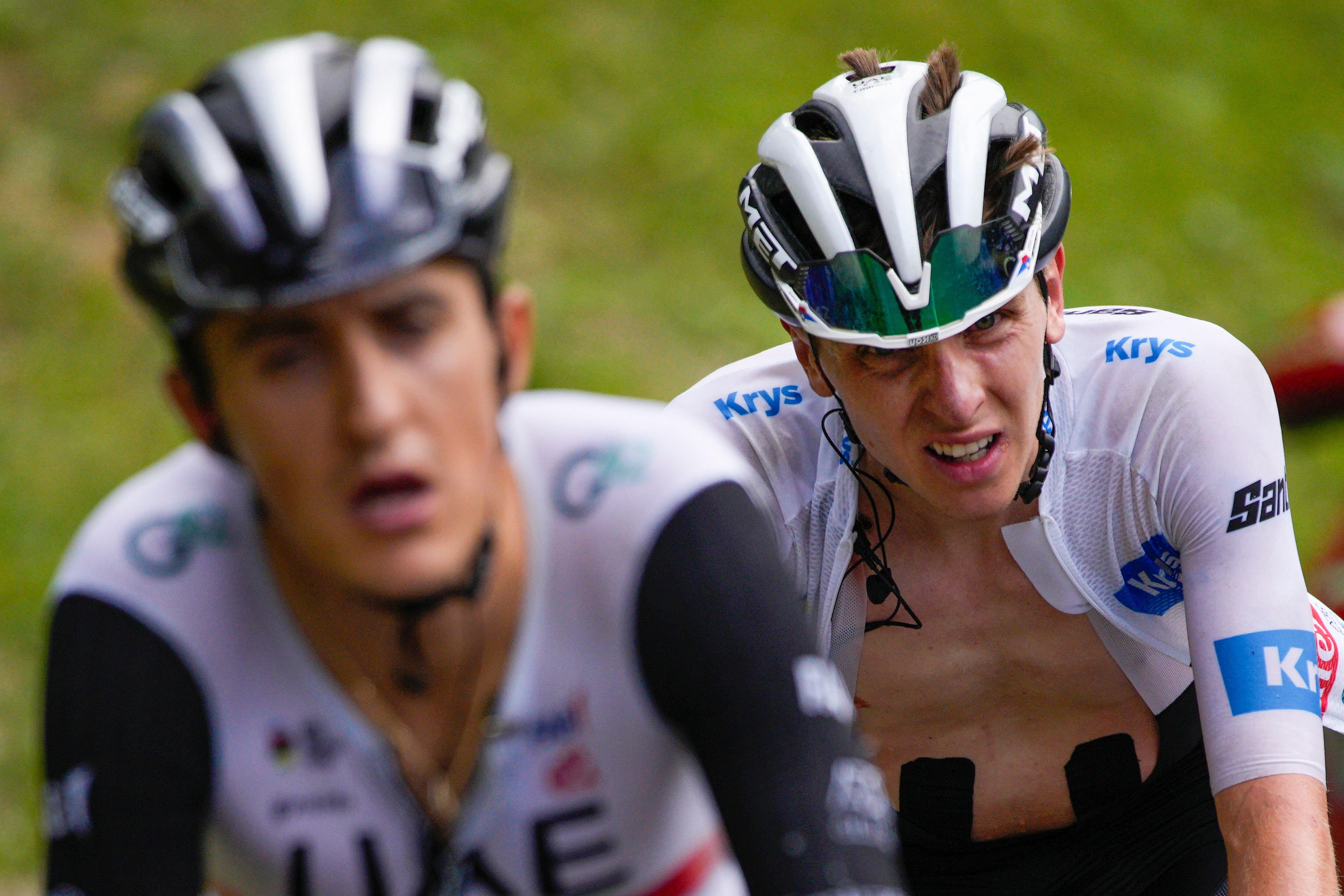 Slovenia's Tadej Pogacar, wearing the best young rider's white jersey, was distanced and follows teammate Spain's Marc Soler during the seventeenth stage of the Tour de France cycling race over 166 kilometers (103 miles) with start in Saint-Gervais Mont-Blanc and finish in Courchevel, France, Wednesday, July 19, 2023. (AP Photo/Daniel Cole)