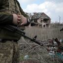 A Ukrainian serviceman stands near the front line with Russia backed separatists in the small town of Pisky, near Donetsk on April 21, 2021. - Ukraine's President Volodymyr Zelensky on April 20, 2021, invited Russian leader Vladimir Putin to meet in war-torn eastern Ukraine, stressing that millions of lives were at stake from fresh fighting in the separatist conflict. (Photo by Aleksey Filippov / AFP)