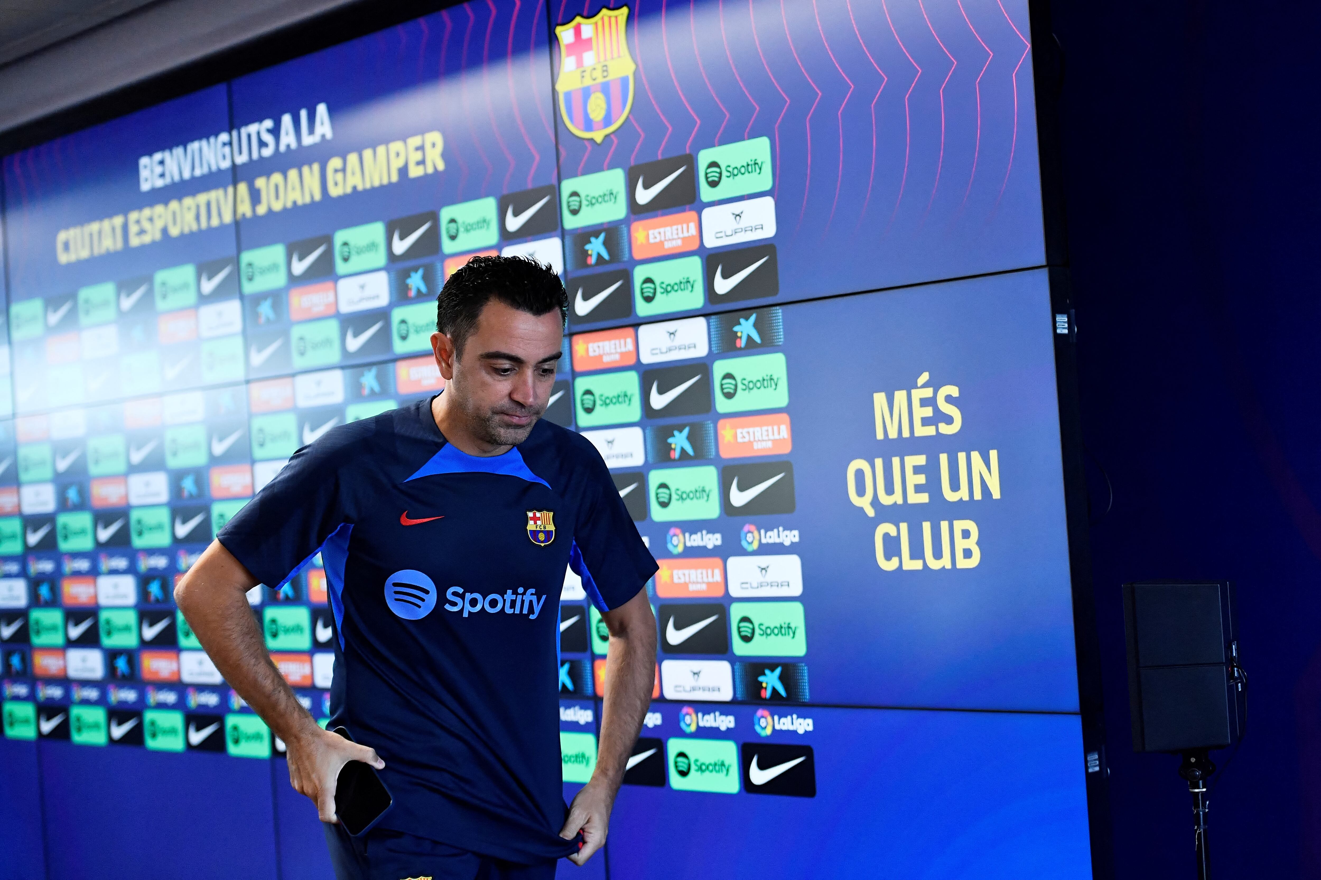 FC Barcelona's Spanish coach Xavi leaves after addressing a press conference on the eve of their Spanish League football match against Real Madrid at the Joan Gamper training ground in Sant Joan Despi, near Barcelona on October 15, 2022. (Photo by Pau BARRENA / AFP)