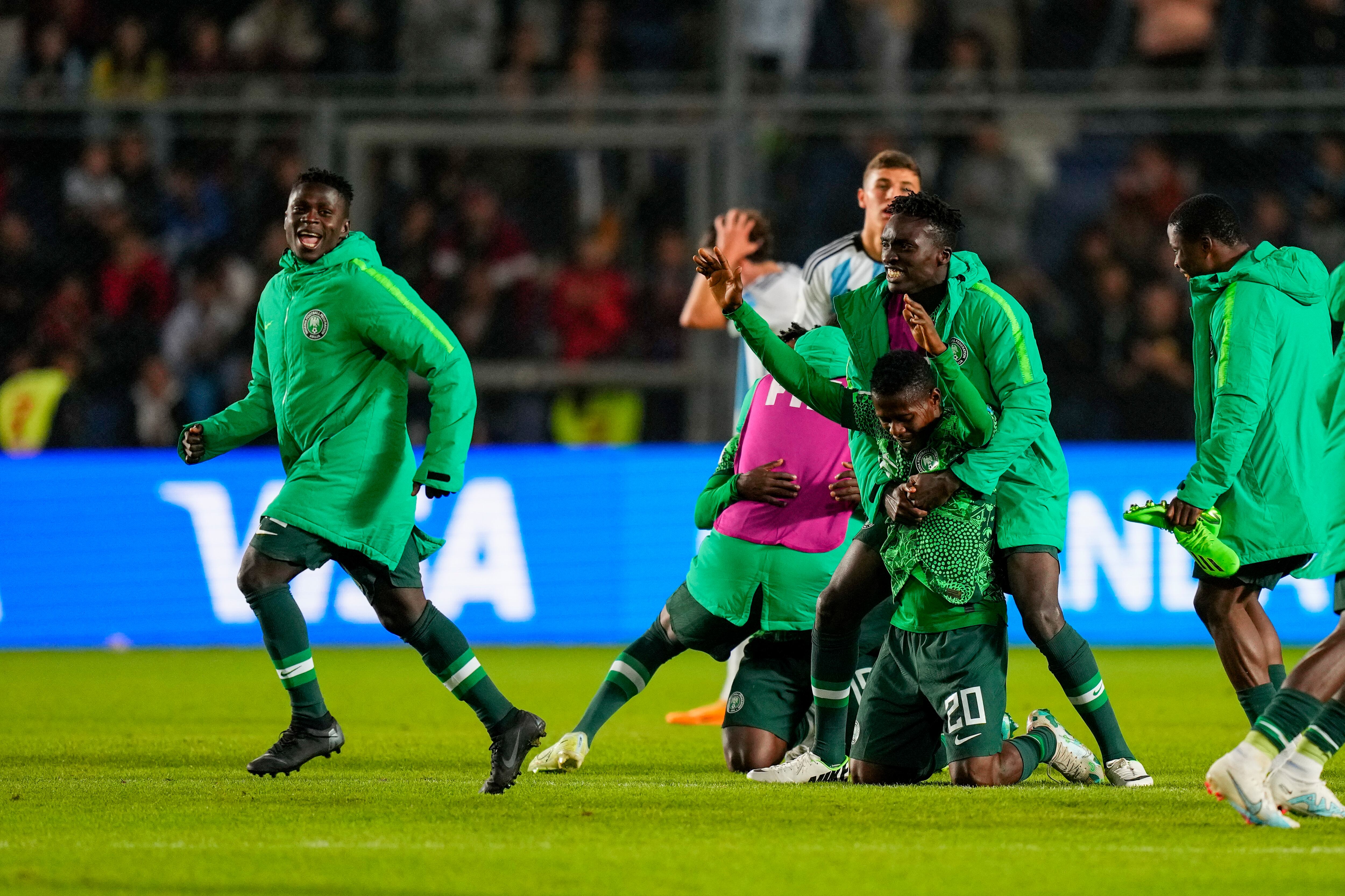 Nigeria's Players celebrate after defeating Argentina 2-0 during a FIFA U-20 World Cup round of 16 soccer match at the Bicentenario stadium in San Juan, Argentina, Wednesday, May 31, 2023. (AP Photo/Natacha Pisarenko)