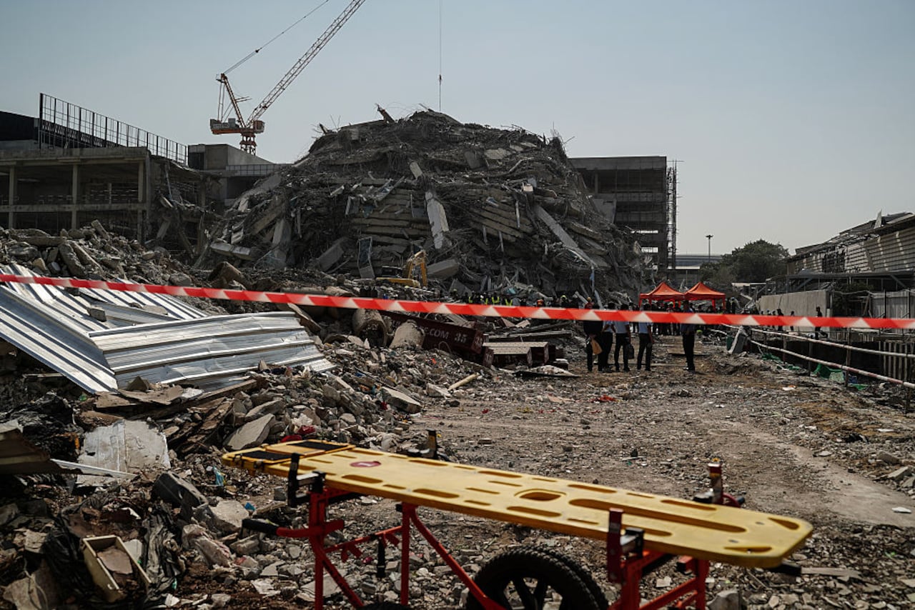 Rescue workers search for survivors of a building collapse after an earthquake in Bangkok, Thailand, on March 28, 2025. A 7.7 magnitude earthquake strikes Myanmar, according to the United States Geological Survey (USGS), with tremors felt in neighboring Thailand. (Photo by Anusak Laowilas/NurPhoto via Getty Images)