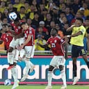 Colombia's Carlos Cuesta, third left, heads the ball during a qualifying soccer match for the FIFA World Cup 2026 against Ecuador at the Rodrigo Paz Delgado stadium in Quito, Ecuador, Tuesday, Oct. 17, 2023. (AP Photo/Patricio Teran)