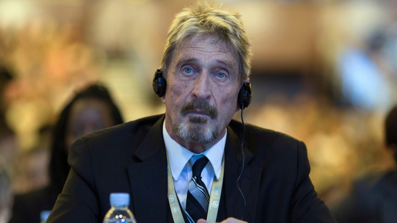 Founder of the first commercial anti-virus program that bore his name, John David McAfee listens during the 4th China Internet Security Conference (ISC) in Beijing, Tuesday, Aug. 16, 2016. Despite China's tight controls on the flow of information on the internet, online fraud and identity theft are posing major challenges to authorities as e-commerce and other online services boom. Chinese characters at top reads "Enterprise Safety Leader" (AP Photo/Ng Han Guan)