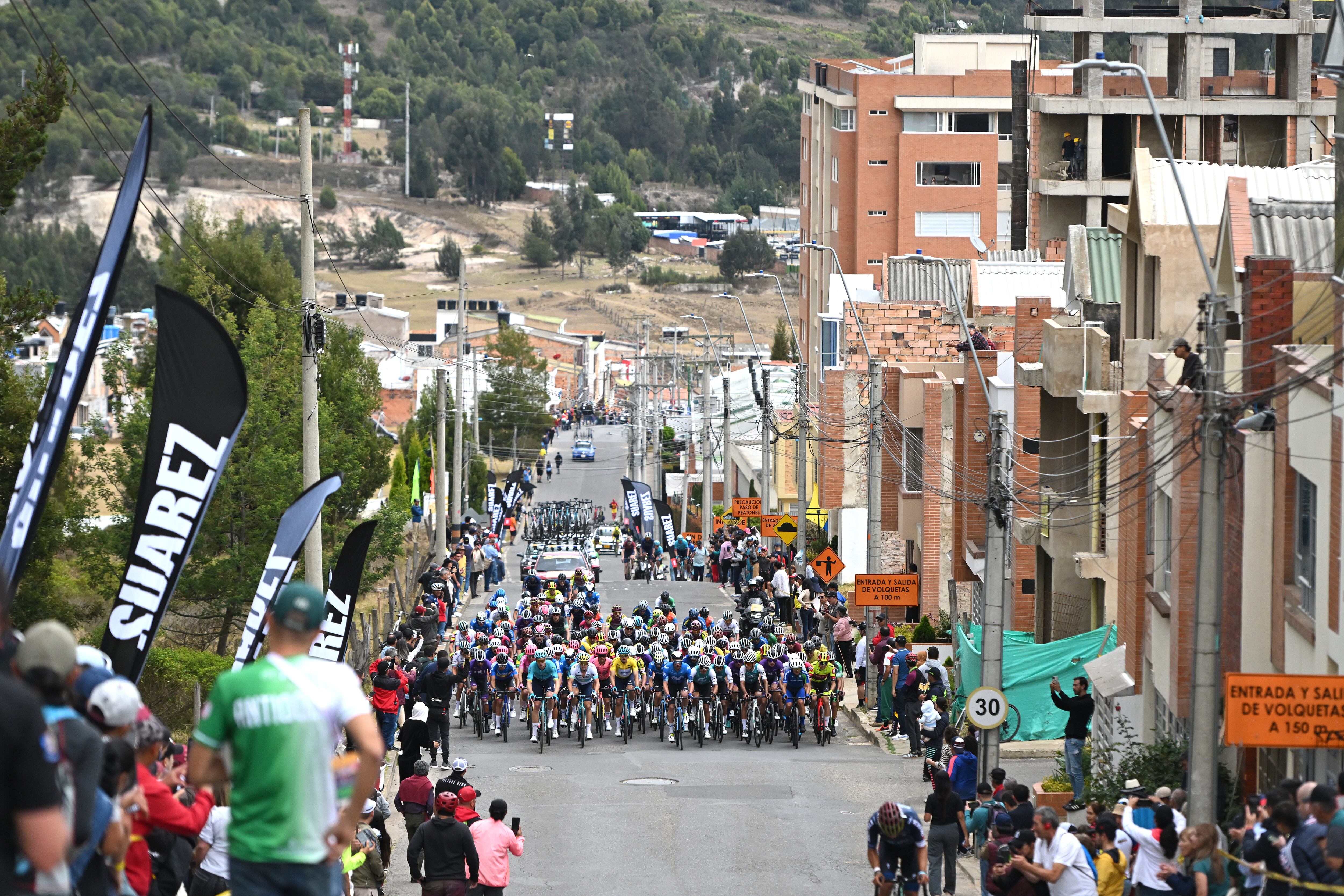 UNJA, COLOMBIA - FEBRUARY 08: Harold Tejada of Colombia and Astana Qazaqstan Team - Yellow Leader Jersey, Albert Torres of Spain and Movistar Team, Cees Bol of The Netherlands, Alexey Lutsenko of Kazakhstan and Astana Qazaqstan Team and a general view of the peloton competing during the 4th Tour Colombia 2024, Stage 3 a 141.9km stage from Tunja to Tunja on February 08, 2024 in Tunja, Colombia. (Photo by Maximiliano Blanco/Getty Images)