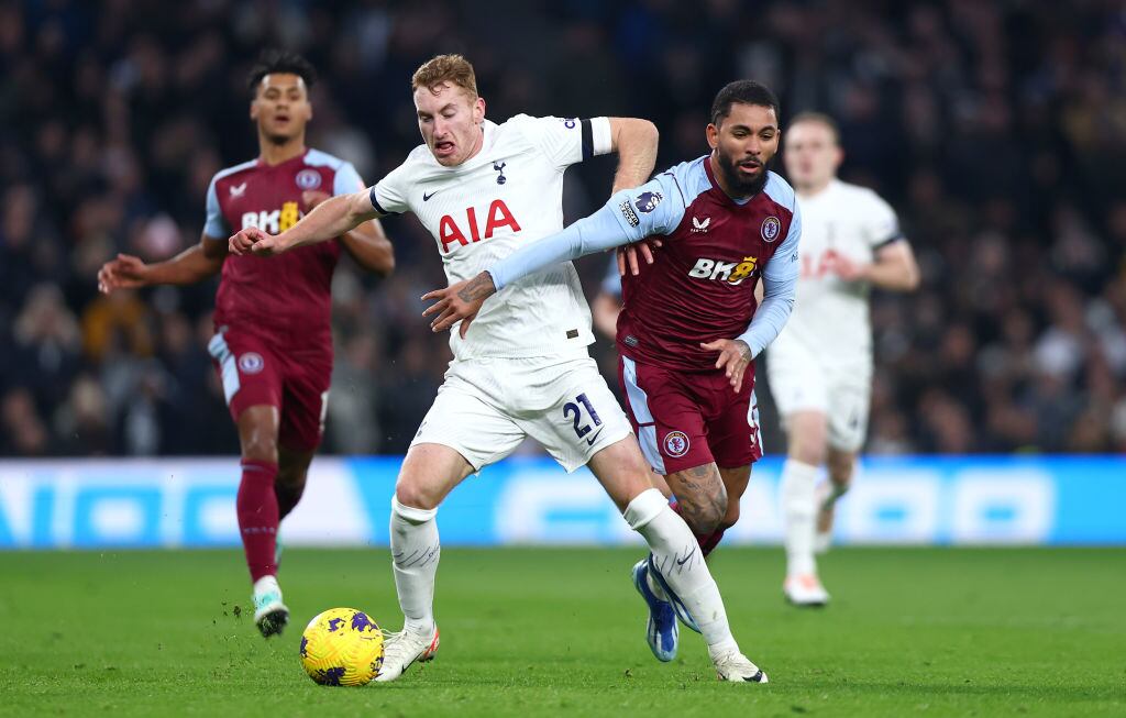 LONDON, ENGLAND - NOVEMBER 26: Dejan Kulusevski of Tottenham Hotspur  and Douglas Luiz of Aston Villa battle for the ball during the Premier League match between Tottenham Hotspur and Aston Villa at Tottenham Hotspur Stadium on November 26, 2023 in London, England. (Photo by Chloe Knott - Danehouse/Getty Images)
