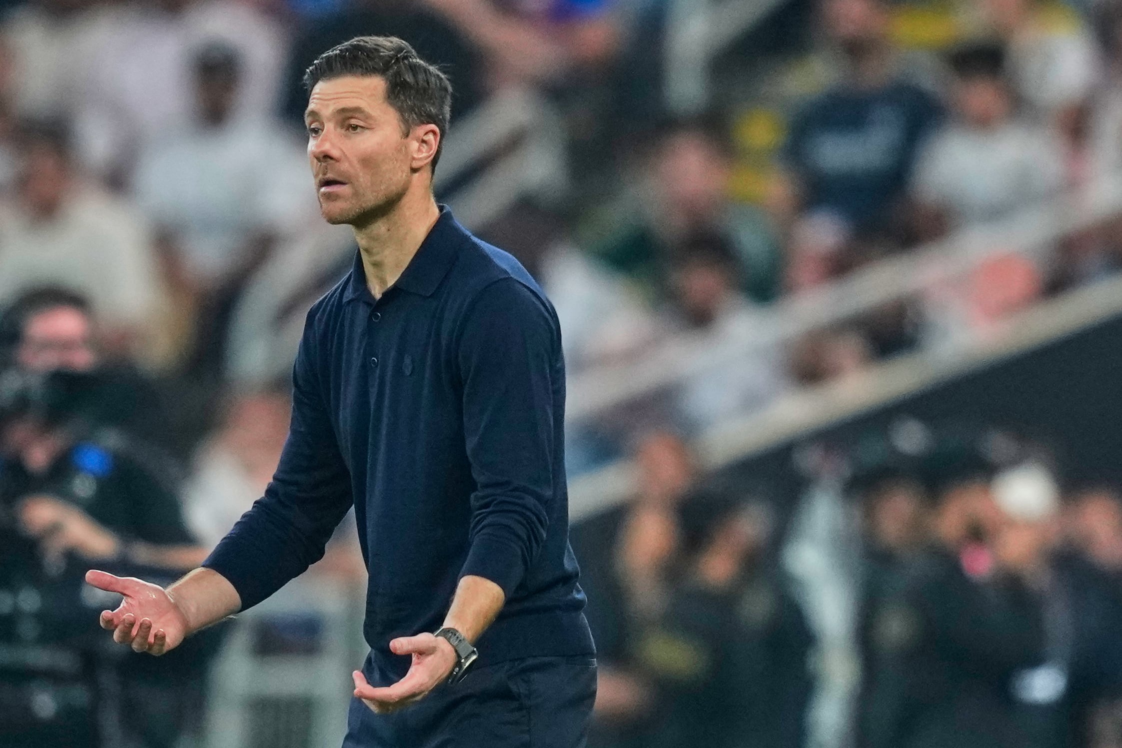 Real Madrid's head coach Xabi Alonso gestures during the Spanish Super Cup semifinal soccer match against Atletico Madrid at King Abdullah Sports City Stadium in Jeddah, Saudi Arabia, Thursday, Jan. 8, 2026. (AP Photo/Altaf Qadri)