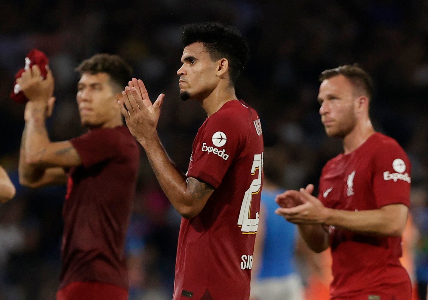 Soccer Football - Champions League - Group A - Napoli v Liverpool - Stadio Diego Armando Maradona, Naples, Italy - September 7, 2022 Liverpool's Luis Diaz, Roberto Firmino and Arthur applaud fans after the match REUTERS/Ciro De Luca