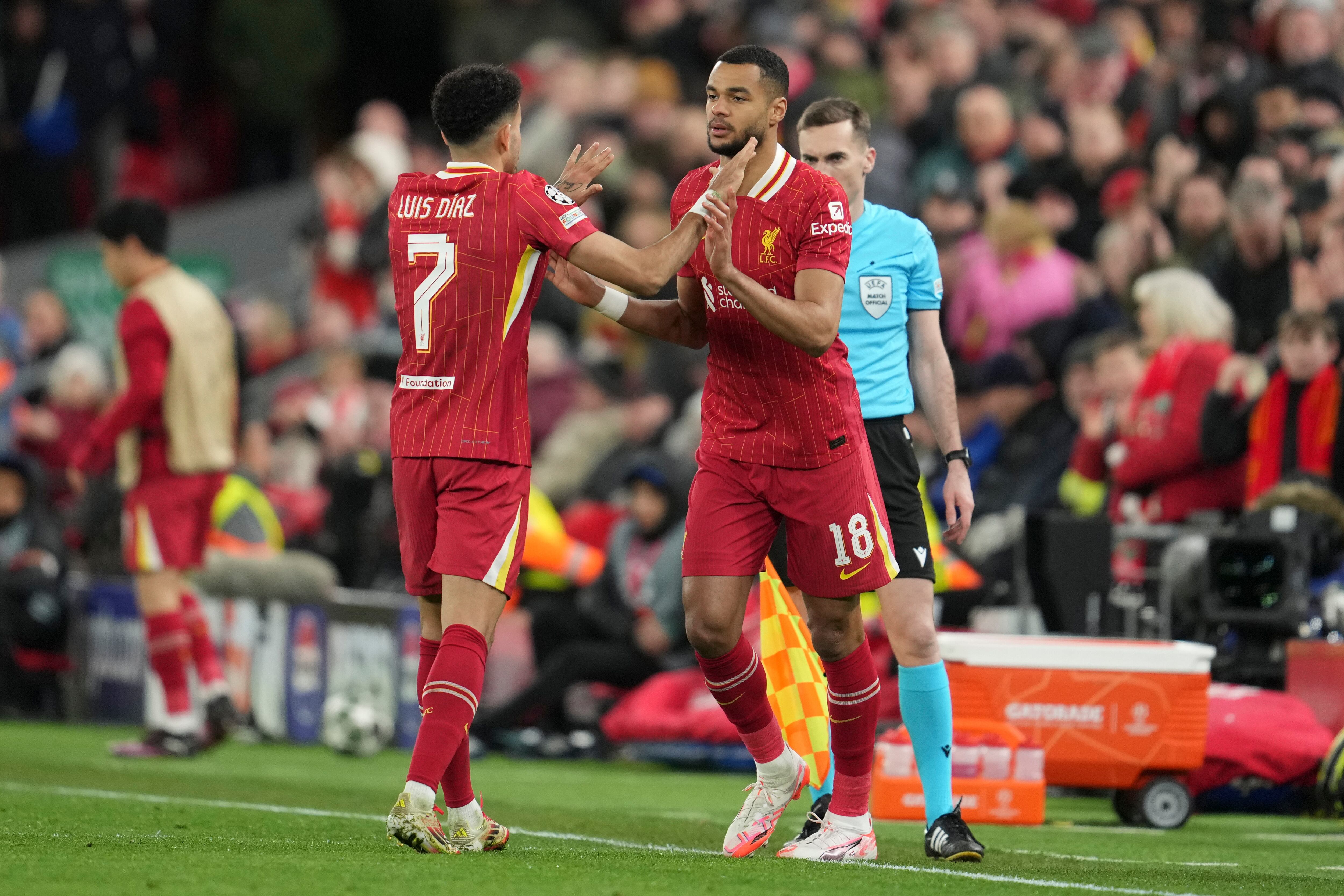 Liverpool's Luis Diaz is substituted by Cody Gakpo during the Champions League round of 16 second leg soccer match between Liverpool and Paris Saint-Germain at Anfield in Liverpool, England, Tuesday, March 11, 2025. (AP Photo/Jon Super)