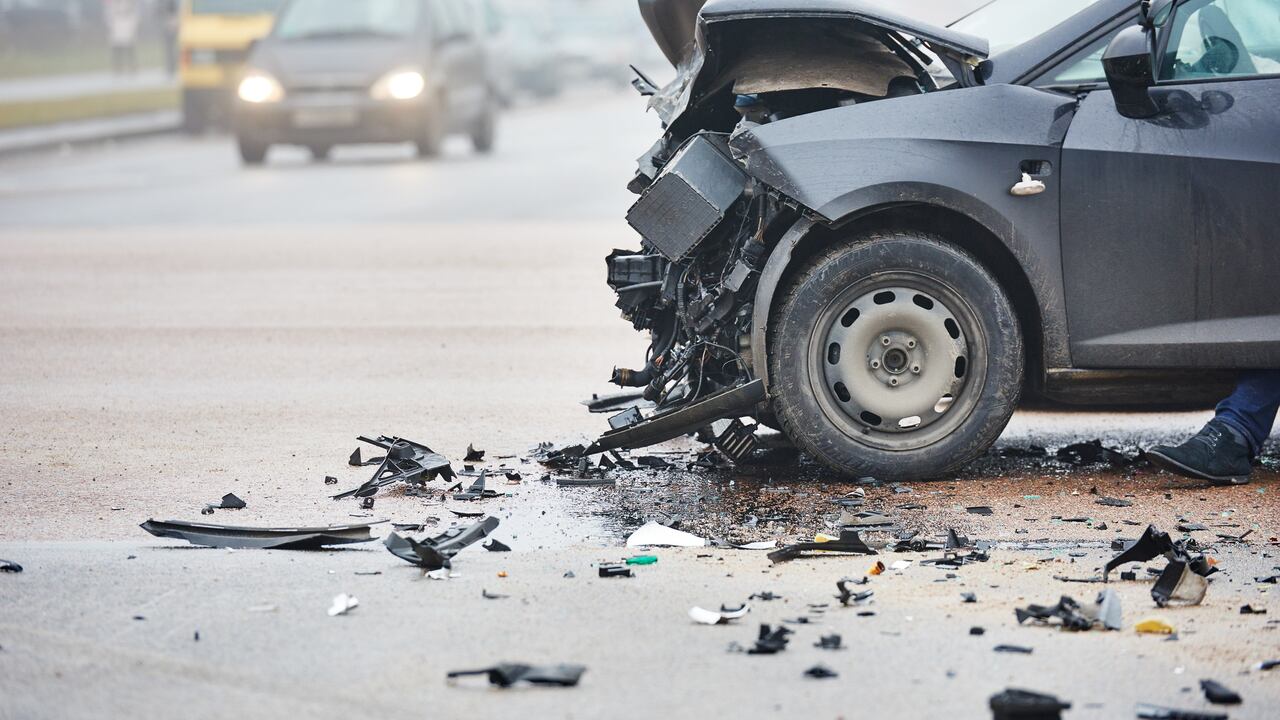 car crash accident on street, damaged automobiles after collision in city