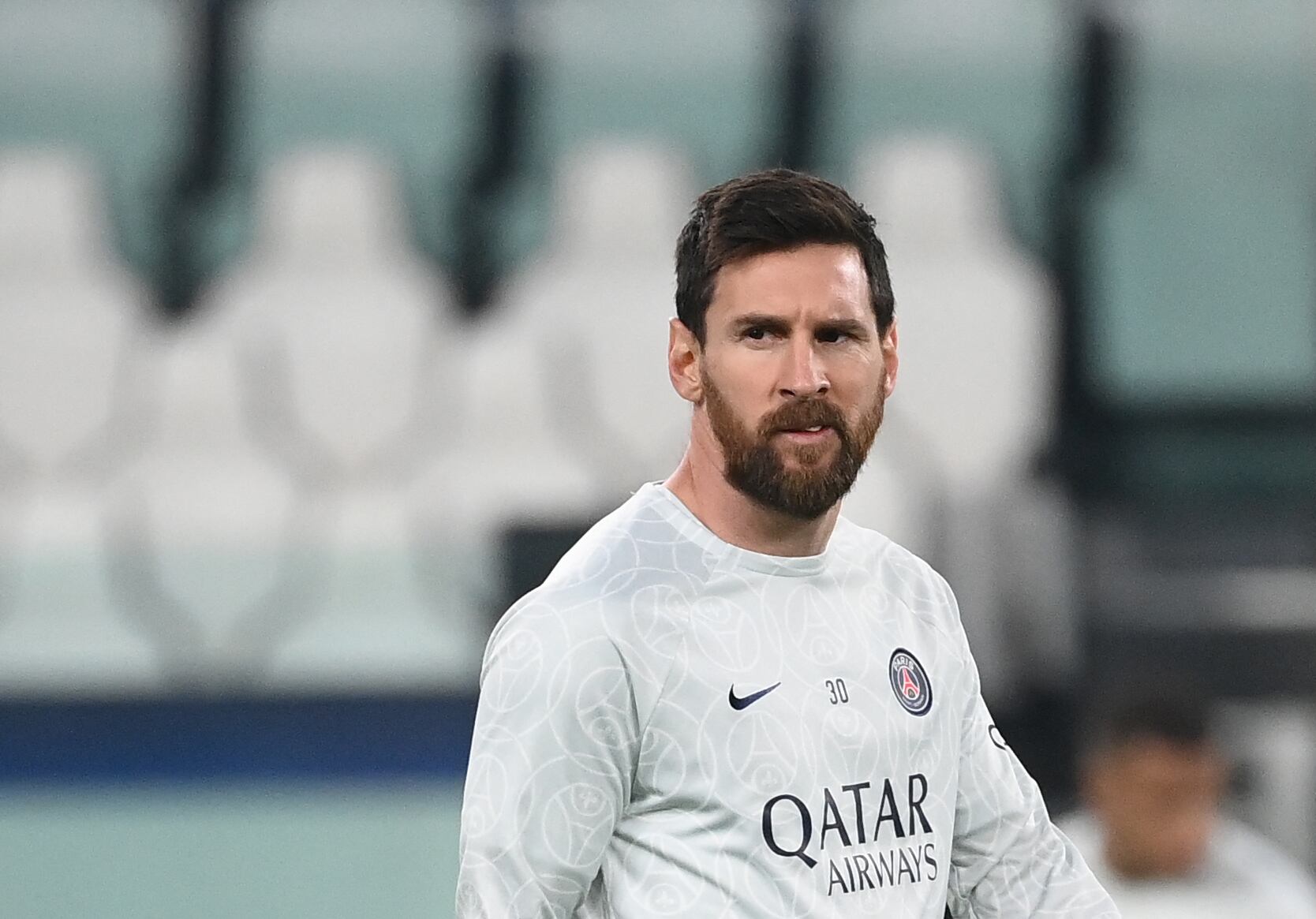 Paris Saint-Germain's Argentine forward Lionel Messi looks on prior to the UEFA Champions League 1st round day 6 group H football match between Juventus Turin and Paris Saint-Germain (PSG) at the Juventus stadium in Turin on November 2, 2022. (Photo by FRANCK FIFE / AFP)