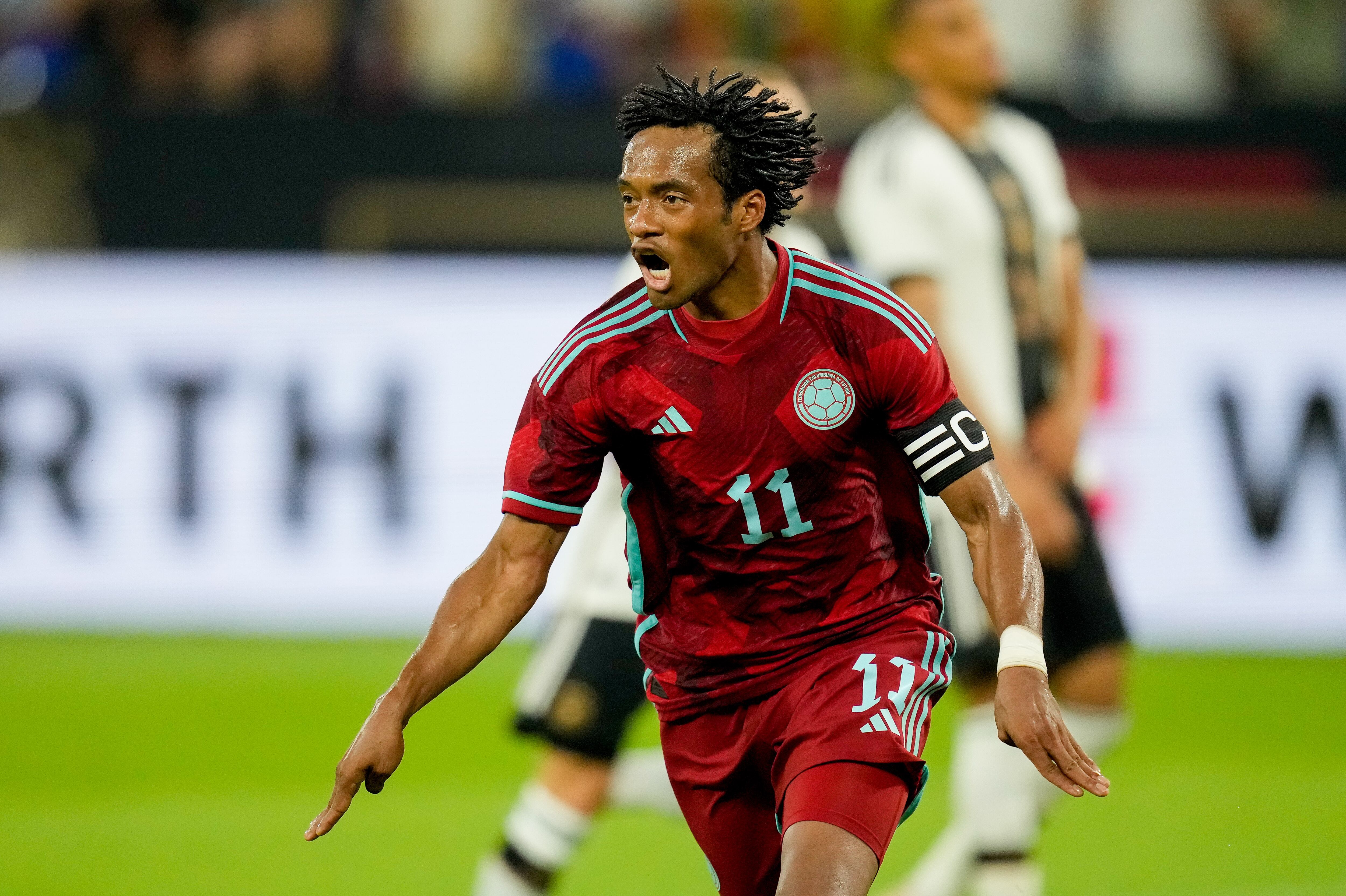 Cuadrado celebrando un gol con la Selección Colombia