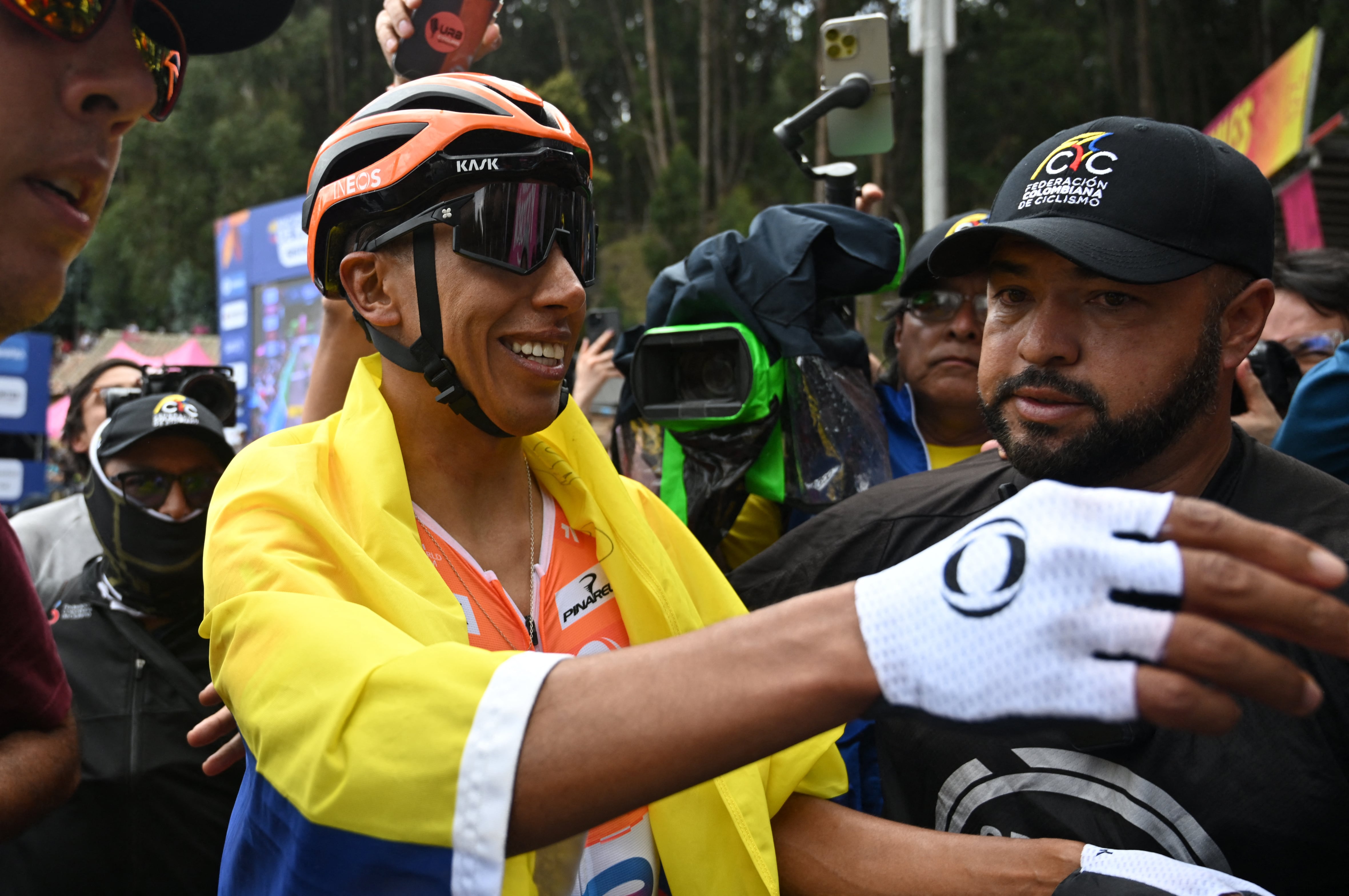 Colombian cyclist Egan Bernal celebrates after crossing the finish line to win the National Road Cycling Championships in Zipaquira, Colombia on February 8, 2026. (Photo by Raul ARBOLEDA / AFP)
