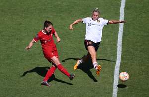 BIRKENHEAD, ENGLAND - MAY 27: Niamh Fahey of Liverpool battles for possession with Alessia Russo of Manchester United during the FA Women's Super League match between Liverpool and Manchester United at Prenton Park on May 27, 2023 in Birkenhead, England. (Photo by Matt McNulty - The FA/The FA via Getty Images)