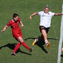 BIRKENHEAD, ENGLAND - MAY 27: Niamh Fahey of Liverpool battles for possession with Alessia Russo of Manchester United during the FA Women's Super League match between Liverpool and Manchester United at Prenton Park on May 27, 2023 in Birkenhead, England. (Photo by Matt McNulty - The FA/The FA via Getty Images)