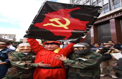 Los manifestantes contra el presidente Chávez lo relacionaron con miembros de las Farc como el Mono Jojoy y Alfonso Cano. 