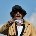 US actor and film producer Johnny Deep, gestures during the photocall to promotes his film "Crock of Gold: A Few Rounds with Shane Macgoman" at the 68th San Sebastian Film Festival, in San Sebastian, northern Spain, Sunday, Sept. 20, 2020. (AP Photo/Alvaro Barrientos)