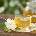 delicious green tea in a beautiful glass bowl on a table